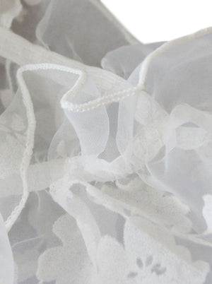 Blusa in pizzo floreale casual con spalle scoperte camicetta maniche corte bianca taglio corto vista di dettaglio